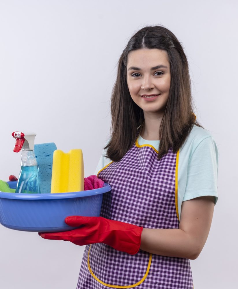 young-beautiful-girl-apron-rubber-gloves-holding-basin-with-cleaning-tools-smiling-with-happy-face